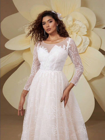 White Premium Bridal Gown With Long Sleeves And A Big Skirt