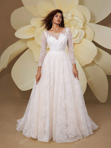 White Premium Bridal Gown With Long Sleeves And A Big Skirt