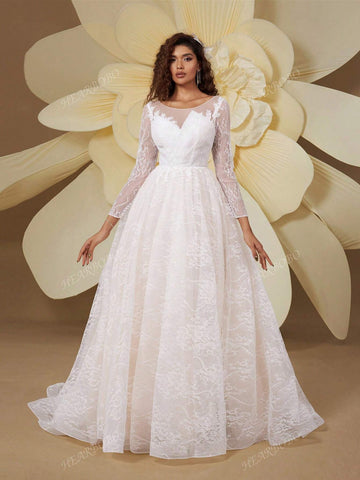 White Premium Bridal Gown With Long Sleeves And A Big Skirt
