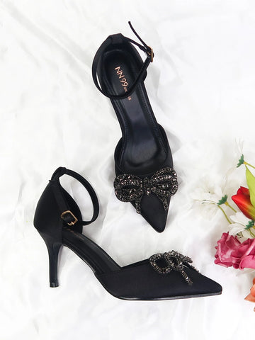 Women Rhinestone & Bow Decor Point Toe Stiletto Heeled Pumps, Party Glamorous Black Solid Satin Ankle Strap Pumps For Outdoor