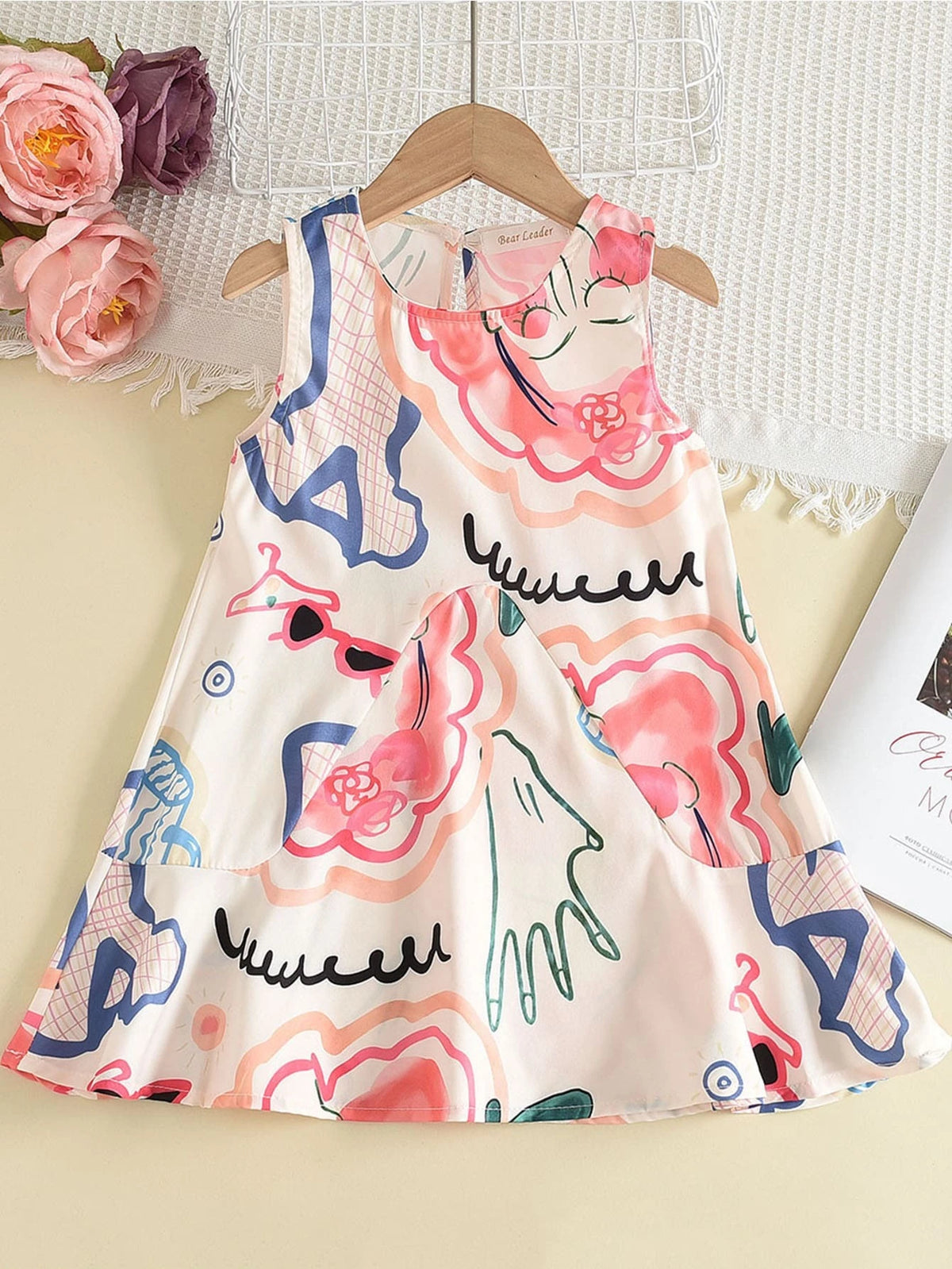 Young Girl Cartoon Graphic Keyhole Back Dress