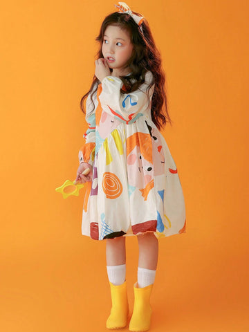 Young Girl Cartoon Graphic Ruffle Hem Dress