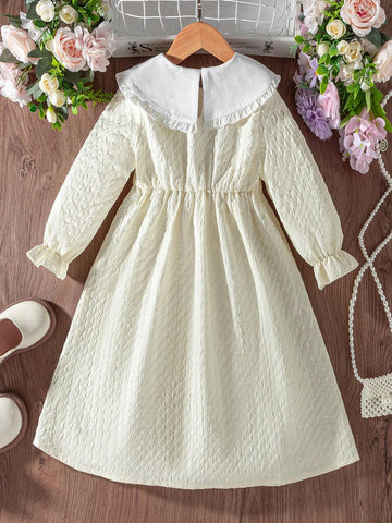 Young Girl' Color Block Dress With Peter Pan Collar, Ruffle Trim Cuffs, Bow Accent, Showing A Sweet And Adorable Style.