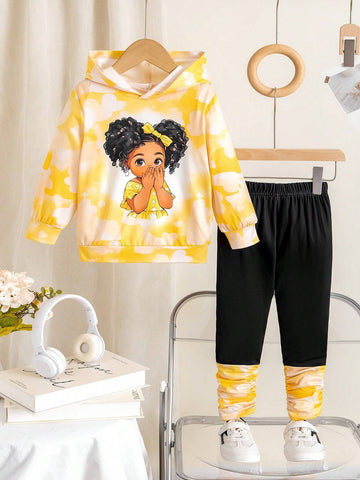 Young Girl' Cute Yellow Hooded Knit Sweater With Cartoon Print, Contrasted With Black Leggings. Comfortable And Fashionable For Everyday Wear. Suitable For Autumn/Winter