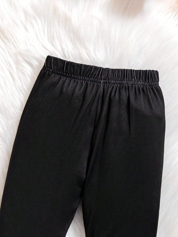 Young Girl' Cute Yellow Hooded Knit Sweater With Cartoon Print, Contrasted With Black Leggings. Comfortable And Fashionable For Everyday Wear. Suitable For Autumn/Winter