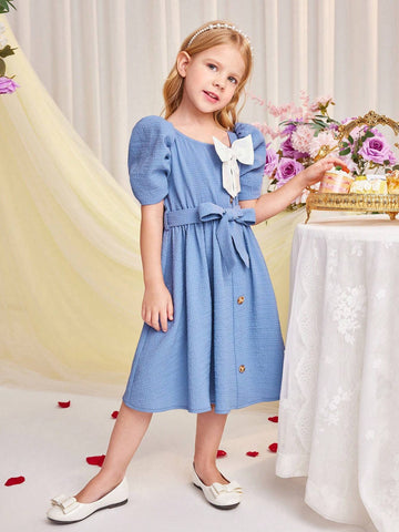 Young Girl Woven Short Sleeve Dress With Bow Knot Decoration And A Waistband For Spring Or Summer
