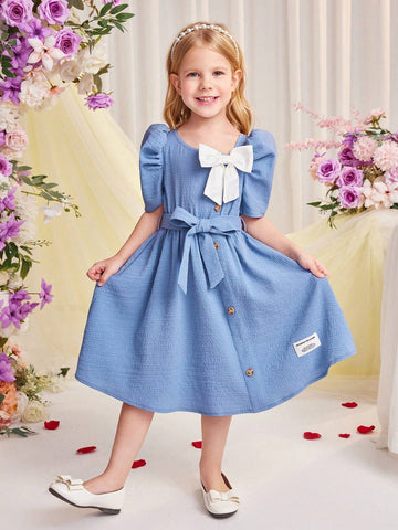 Young Girl Woven Short Sleeve Dress With Bow Knot Decoration And A Waistband For Spring Or Summer