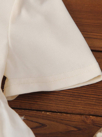 Young Girls' Dress With Floral Appliques And Patchwork Design