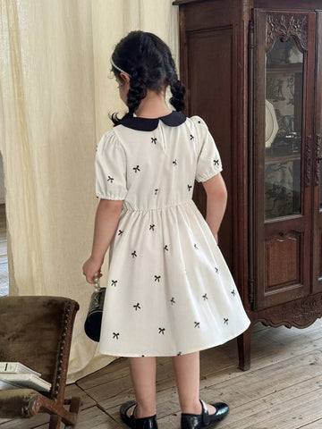 Young Girls' Elegant Bowknot A-Line Dress, Black Textured Fabric, Puff Sleeve, Midi Length, Suitable For Travel, School And Everyday Wear