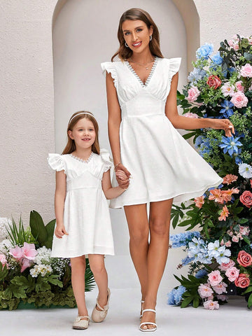 Young Girls' Elegant Swiss Dot Woven Ruffle Trimmed Dress With Decorative Border