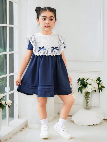 Young Girl's Knitted Color Block Casual Dress With Bow And Ruffle Trimmed Round Neckline