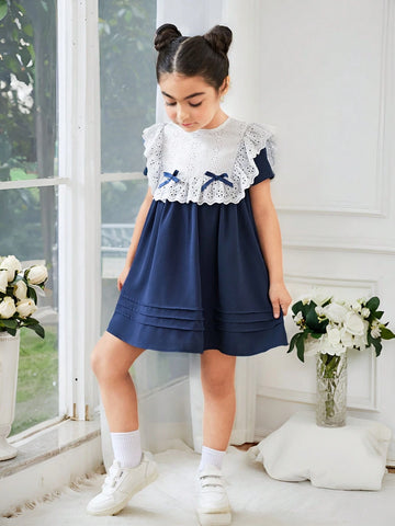 Young Girl's Knitted Color Block Casual Dress With Bow And Ruffle Trimmed Round Neckline