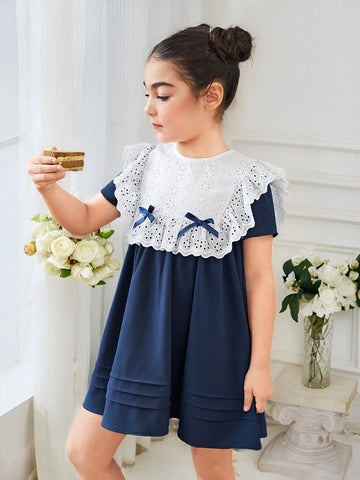 Young Girl's Knitted Color Block Casual Dress With Bow And Ruffle Trimmed Round Neckline
