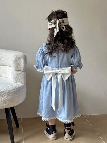 Young Girl's Lace Trimmed Puff Sleeve Dress