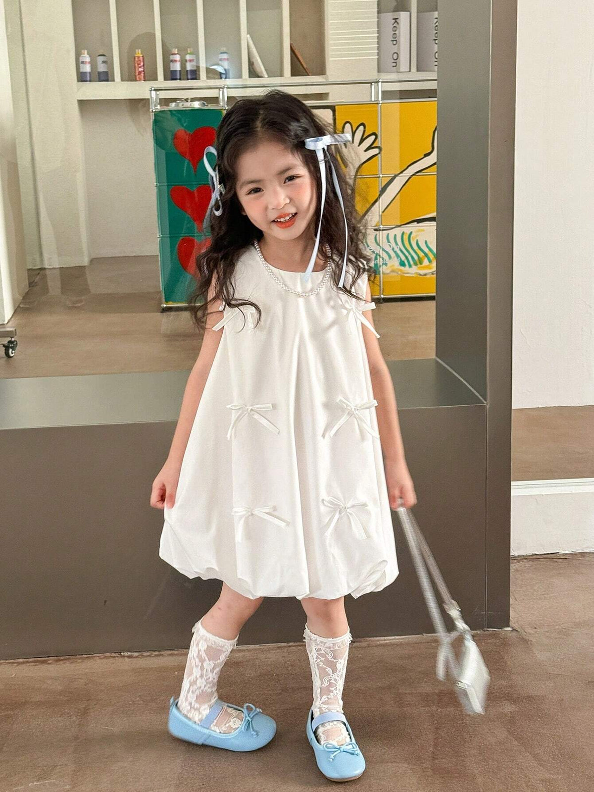 Young Girls Sleeveless Bow Front Ruffle Trim Smock Dress