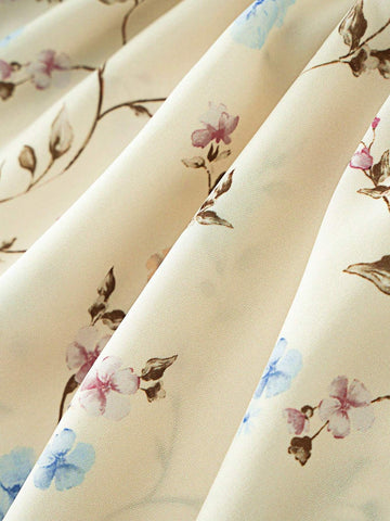 Young Girl's Summer Loose Fit Round Neck Floral Shirt With Ruffled Hemline And Elastic Waist