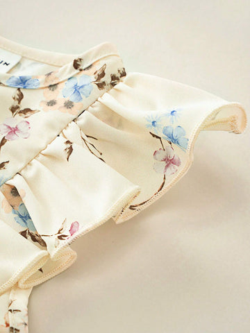 Young Girl's Summer Loose Fit Round Neck Floral Shirt With Ruffled Hemline And Elastic Waist