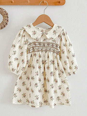 Young Girl's Vintage Ditsy Floral Dress With Peter Pan Collar And Flared Hem, Autumn