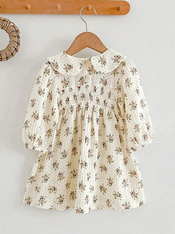 Young Girl's Vintage Ditsy Floral Dress With Peter Pan Collar And Flared Hem, Autumn