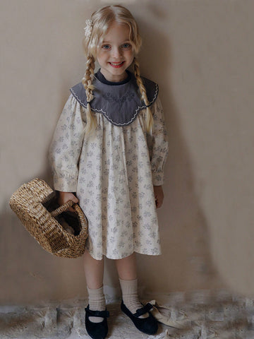 Young Girl's Vintage Style Floral Print Dress With Unique Design