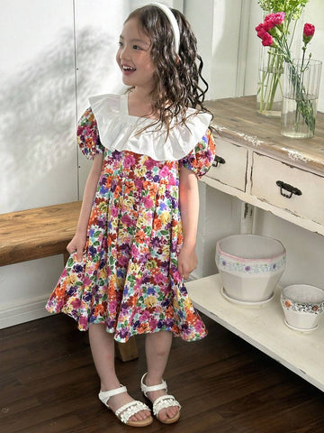 Young Girl's Woven Color Block Ditsy Floral Dress With Ruffle Hemline And Puff Sleeves