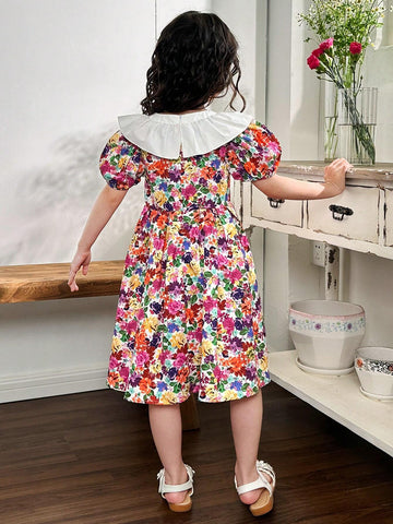 Young Girl's Woven Color Block Ditsy Floral Dress With Ruffle Hemline And Puff Sleeves