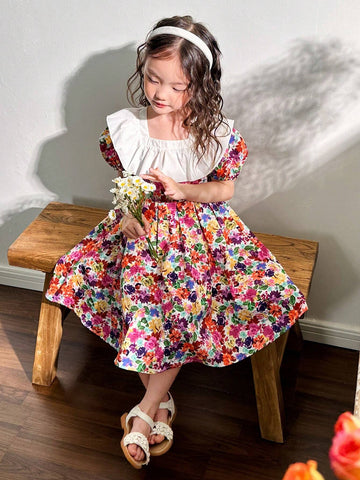 Young Girl's Woven Color Block Ditsy Floral Dress With Ruffle Hemline And Puff Sleeves