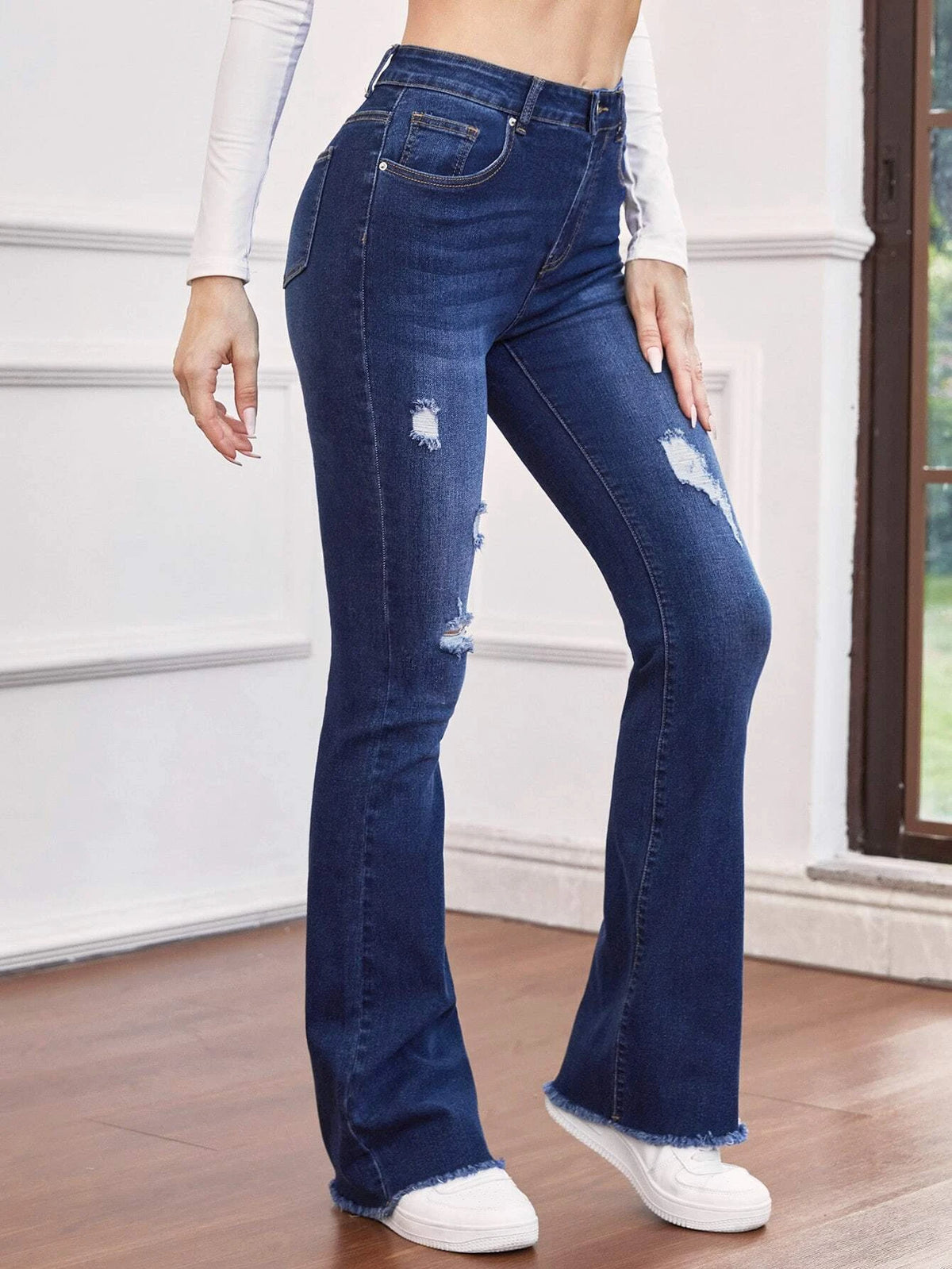 High Waist Ripped Raw Trim Flare Leg Jeans