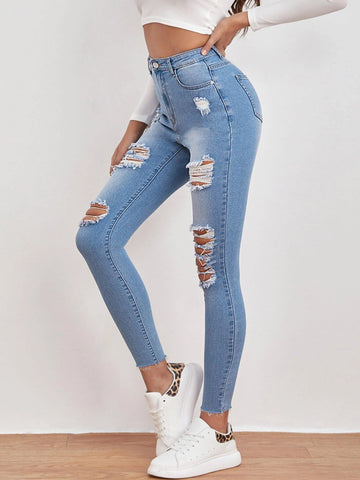 High Waisted Ripped Raw Hem Skinny Jeans