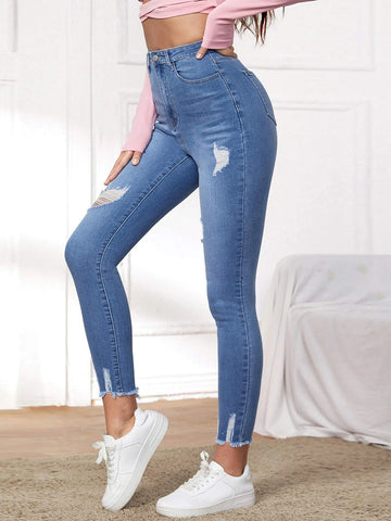 High Waist Ripped Raw Hem Skinny Jeans