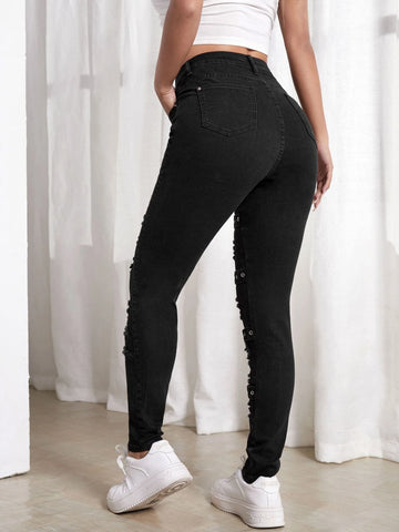 Ripped Grommet Eyelet Buckled Jeans