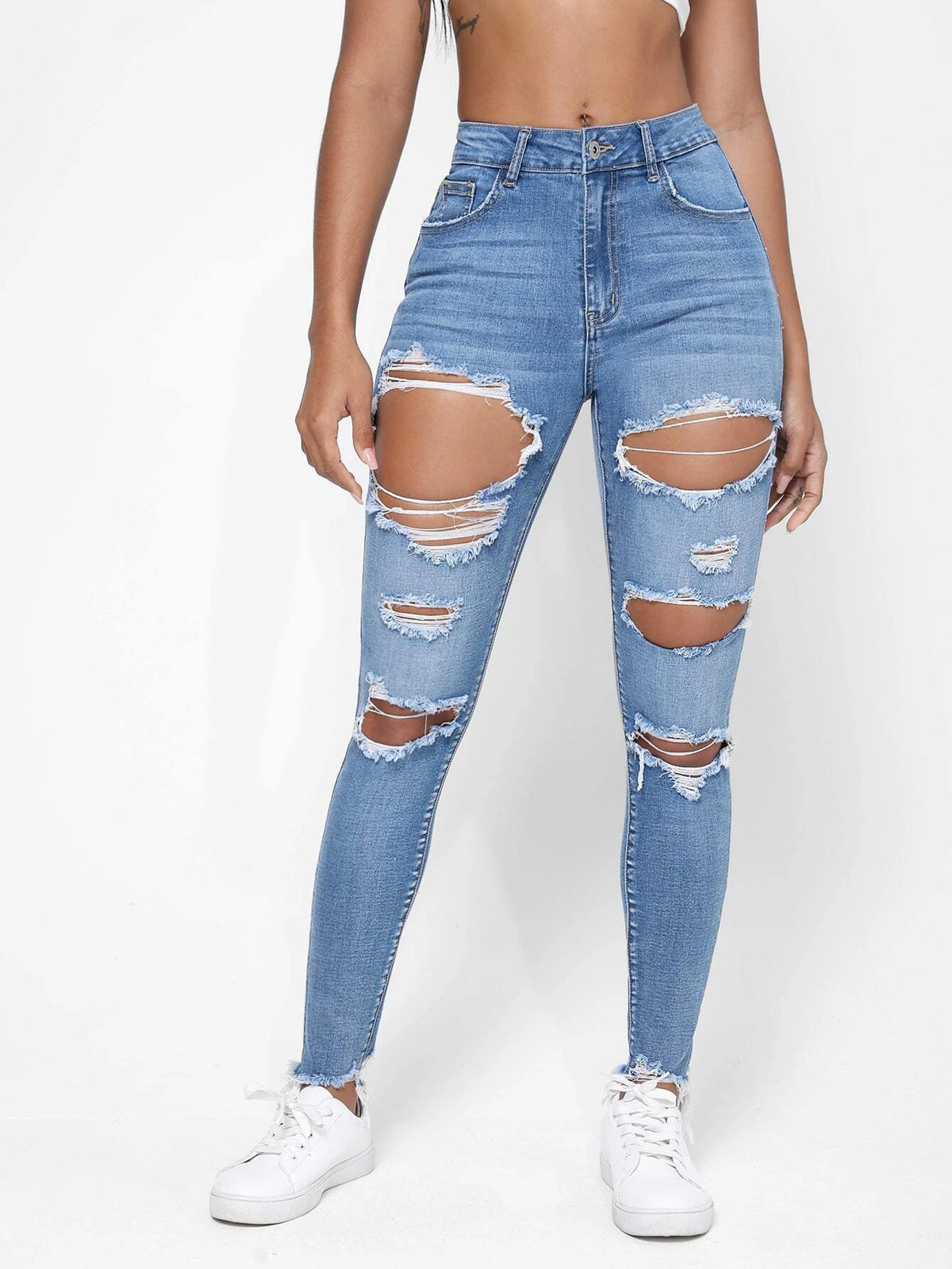 Ripped Raw Trim Skinny Jeans