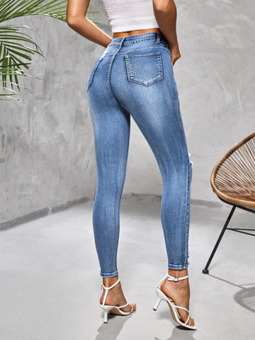 High Waist Ripped Frayed Skinny Jeans