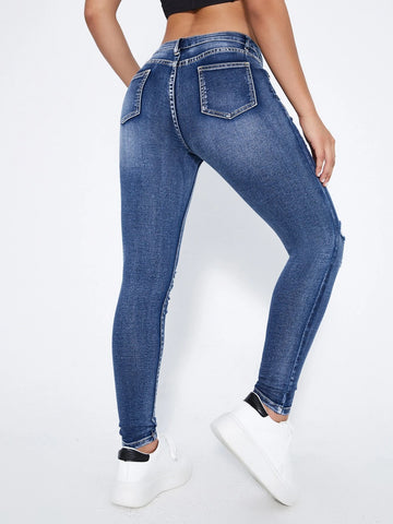 Ripped Moustache Effect Skinny Jeans