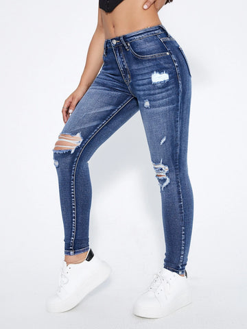 Ripped Moustache Effect Skinny Jeans