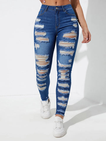 Ladder Distressed Raw Trim Skinny Jeans