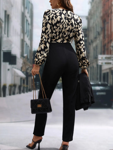 Graphic Print Surplice Neck Belted Jumpsuit