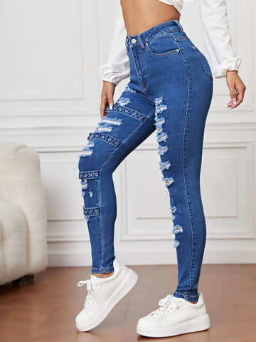 Ripped Grommet Eyelet Buckled Jeans