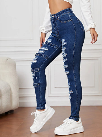 Ripped Grommet Eyelet Buckled Jeans