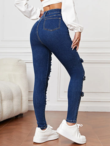 Ripped Grommet Eyelet Buckled Jeans