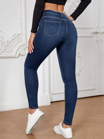 Asymmetrical Waist Skinny Jeans