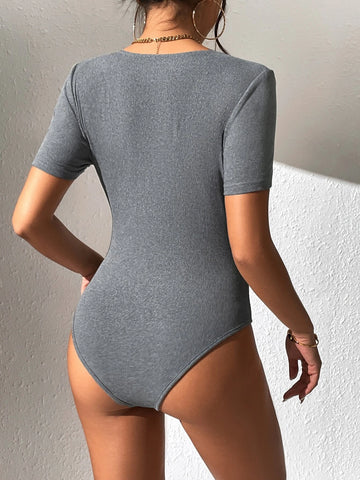 BAE Twist Front Plunging Neck Bodysuit