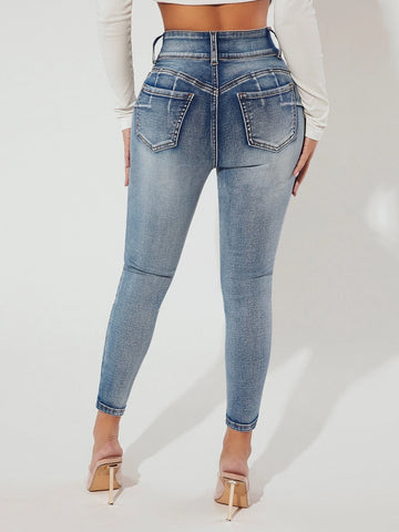 PETITE Bleach Wash Skinny Jeans