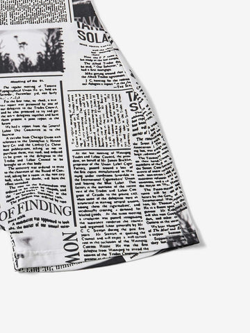 Newspaper Print Criss Cross Backless Unitard Romper