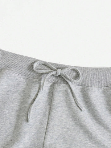 EZwear Knot Waist Star Patched Shorts